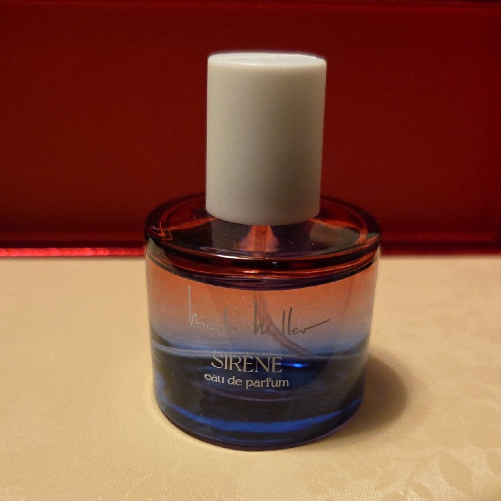 Nicole Miller Sirene Perfume in Blue and Orange Bottle